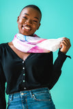 model wearing starling hand painted silk scarf in bright colors