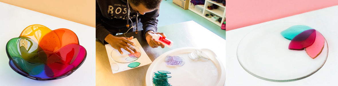 Artisans showing their fused glass creations