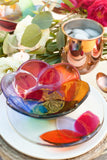 handmade fused glass appetizer plate and bowl in rainbow colors with a floral pattern handmade by people with disabilities